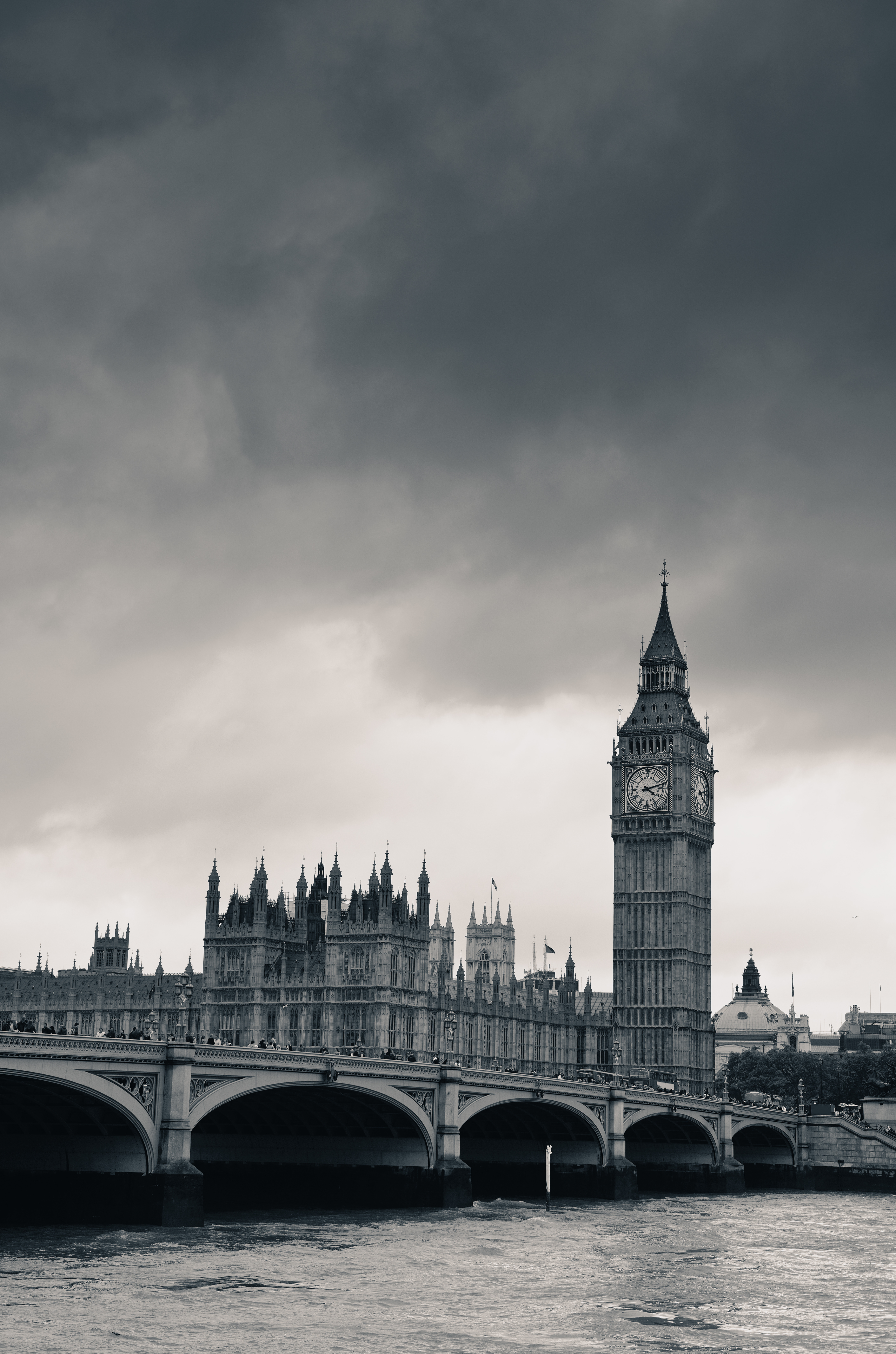 Black-and-white photo of the historic Parliament building in London.